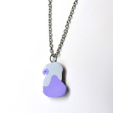 Potion clay necklace.