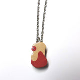 Super Potion clay necklace.